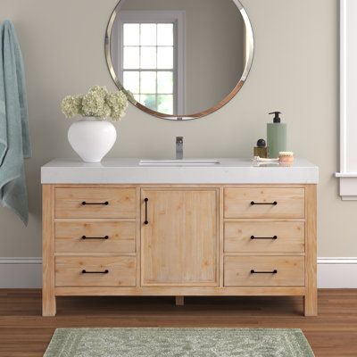 This classic single vanity set brings French country style and plenty of drawer space to your main bathroom or guest bath. Its freestanding frame is made from solid wood with a natural, weathered finish, and its surface is crafted from cultured marble for an elegant design. The included undermount ceramic sink boasts a rectangular silhouette. This vanity comes with six drawers with metal, matte black handles that open to reveal space for washcloths, toothpaste, and hair ties. A soft-close door h Light Wood Bathroom Vanity, Ceramic Undermount Sink, Wood Bathroom Vanity, Drawer Inserts, Drawer Space, Wooden Drawers, Main Bathroom, Wood Vanity, Wood Bathroom