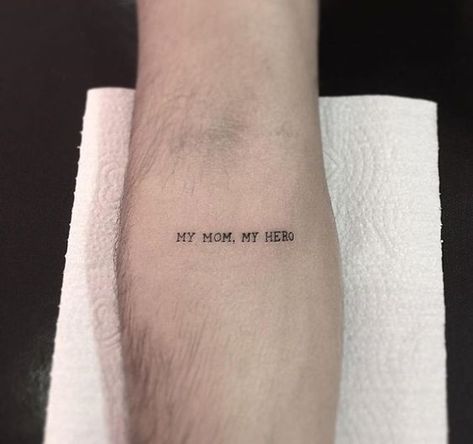 "My Mom, My Hero" quote tattoo on the arm | www.otzi.app My Dad My Hero Tattoo, 1999 Tattoo, Quote Tattoos Girls, Tatuagem Masculina Pequena, Small Chest Tattoos, Elbow Tattoos, Mother Tattoos, Small Tattoos Simple, Small Tattoos For Guys