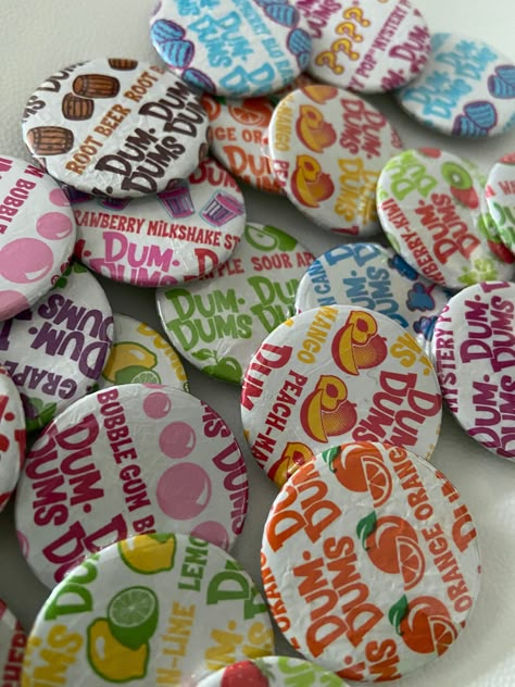 DumDum wrappers turned into pins/buttons. Randomized flavors/designs Cute Pin Designs, Fun Buttons Pins, Diy Pins Buttons, Diy Buttons Pins, Button Pins Design, Pinback Buttons Display, Button Maker Ideas, Pin Ideas Button Diy, Button Ideas Pins