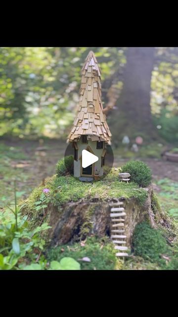 Maryinthefairyland on Instagram: "A fairy house crafted from a recycled bottle, polymer clay, and adorned with charming wooden windows and shingles.

Watch the full DIY tutorial on my YouTube channel: https://youtu.be/2DV7CZk5QMg (link in BIO)

#fairyland #fairyvillage #fairyforest #whimsicalworld #enchantedforest #enchantedhouses #fairyhouse #fairyhouses #fairydwellings #fairytales #feenhaus #gnomehouse #gnomehome #pixiehouse #pixiehollow #pixiedwellings #diyfairyhouse #wichtelhaus #fairymagic #hobbithouse  #naturecraft #NatureCrafts  #RecycledCrafts #PolymerClay #FairyGarden#Handmade #CraftTutorial #youtubediy" Fairy Windows Diy, Clay Fairy House Ideas, Painting Fairy Houses, Clay Fairy House Diy, Fairy Houses Diy, Mini Fairy House, Glass Bottle Diy Decoration, Diy Fairy House, Fairy House Garden