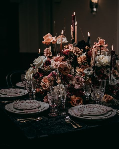 Pattern on pattern on pattern - but make it classy! We love the subtle black damask in this linen mixed with the white details of the chargers and dinner plates. 🍽️Top it with a red floral patterned salad plate and tie it together with a velvet napkin and you have a table set to make a statement! ✨ The mixed glassware is just the cherry on top! . . . #tablesetting #weddingtablesetting #weddingtabledecor #plates #chargerplates #bridgerton #halloweenwedding #fallwedding #spookyseason #classy ... Moody Wedding Cakes, Moody Table Setting, Mixed Glassware, Wedding Styled Shoot, Spring 2025, Moody Wedding, Floral Ribbon, White Details, Wedding Table Settings