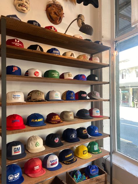 Baseball Cap Collection Display, Hat Display Ideas Wall Retail, Cap Display Ideas, Mens Wear Shop Interior Design, Mens Wear Shop, Baseball Caps Storage, Diy Hat Rack, Gaming Bedroom, Shoe Store Design