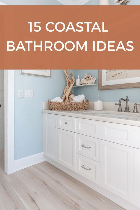 Make a stunning coastal bathroom with these tips and decor ideas. Lake House Bathroom Mirrors, Coastal Double Vanity, Small Coastal Bathroom Remodel, Light Blue And Gray Bathroom, Pale Blue And White Bathroom, Coastal Style Bathroom Ideas, Coastal Vibe Bathroom, Bathroom With White Vanity Ideas, Light Blue Master Bath