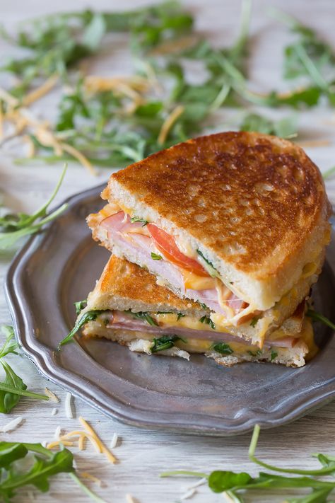 This totally cheesy Canadian BLT Grilled Cheese is stuffed with cheese, arugula, tomato and Canadian bacon. It's toasted till perfection and ready in no time! Canadian Bacon Sandwich, Canadian Bacon Recipes, Blt Grilled Cheese, Bacon Blt, Panini Sandwiches, Croque Madame, Bacon Tomato, Hot Sandwich, Canadian Bacon