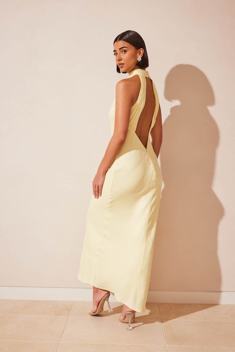 Look no further than the CLAIRE Satin Drape Back Maxi Dress for a timeless and elegant impression at your next special event. Showcasing a minimalistic silhouette, Claire is transformed with her striking open-back that will have you turning heads. Accompanied by statement accessories, she makes the perfect piece for weddings, work functions or celebratory dinners. Meshki Claire Dress, Neutral Dresses Formal, Light Yellow Weddings, Light Yellow Dress, Pale Yellow Dress, Summer Dress Long, Dresses Date Night, Yellow Maxi Dress, Ice Dresses