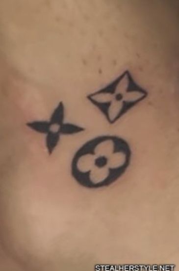 Louis Vuitton tattoo Lv Tattoo Louis Vuitton, Gucci Tattoo Ideas, Tatts Men, Louis Vuitton Tattoo Ideas, Ysl Tattoo, Lv Tattoo, Gucci Tattoo, Louis Vuitton Tattoo, Butterfly Tattoo Cover Up