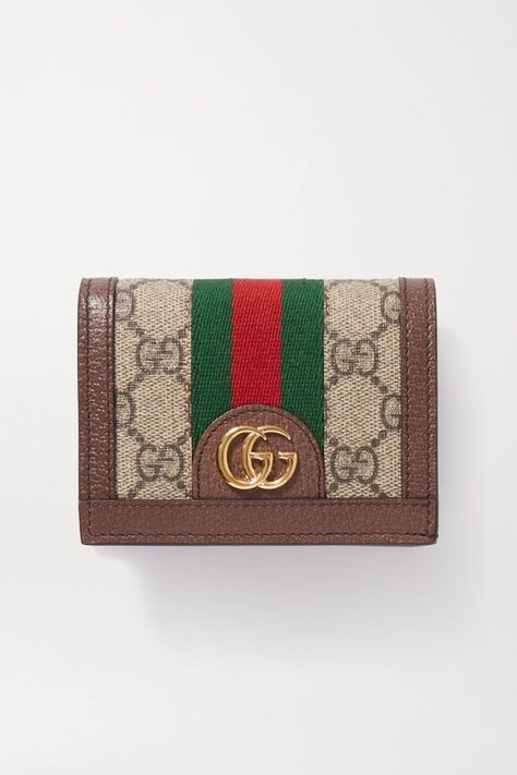 Women's Gucci Ophidia Textured Leather-trimmed Printed Coated-canvas Wallet - Brown - Wallets As classic Gucci as you can get, this 'Ophidia' wallet has been made in Italy from monogrammed coated-canvas detailed with striped webbing and a logo plaque. Traced with textured-leather, it has a snap-fastening flap and plenty of room inside. Dompet Gucci, Gucci Wallet Women, Gucci Bags Handbags, Cowhide Clutch, Luxury Wallets, Wallets For Girls, Gucci Ophidia, Canvas Wallet, Stylish Purse