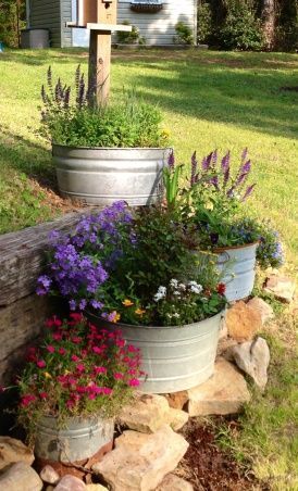 Fill Your Deck with Plants - Soften your space with beautiful blooms and lush greenery from container gardens. It's easy to tuck a few containers here and there. Here's a hint: You may not be limited to growing annuals. Perennials and shrubs survive outdoors in containers if the container is large enough, which may be 4- to 5-feet wide in northern climates. Farmhouse Landscaping, Photo Fails, Rock Garden Landscaping, Have Inspiration, Garden Containers, The Secret Garden, Design Landscape, Rustic Gardens, Country Gardening