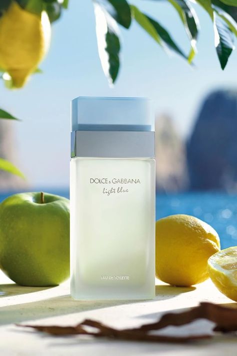 Dolce&Gabbana Light Blue captures the quintessence of a summer day lulled by gentle waves lapping against the enchanting cliffs of Capri. Blends the zesty freshness of citrus with a delicate floral bouquet, giving way to seductively warm, woody notes. Apply this Eau de Toilette to the pulse points at your chest, neck and behind your ears. Lemon Crisp, Perfume Light Blue, Dolce And Gabbana Perfume, Light Blue Perfume, Apple Heart, Apple Notes, Blue Perfume, Sicilian Lemon, Woody Notes