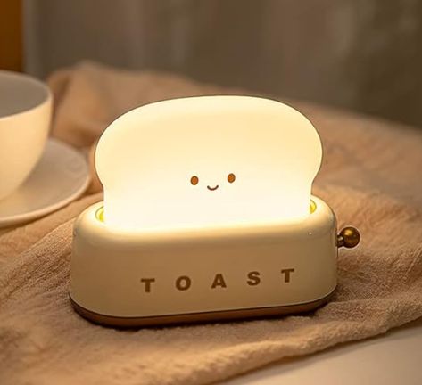 Cute Toast Bread LED Night Lamp,Creative USB Rechargeable Toast Night Light, Single or Two Sided Night Light: It can switch between single- or double-sided light,smart use of backlight,night playing mobile phone back light to prevent dazzle.The LED bread light uses 4000Kwarm clolor light,warm without glare and can effectively protect your eyes. Rechargeable: 1200mAh large capacity li-on battery. It has a large battery capacity and long-lasting power. Easy to charge with USB cable. Cute Toast, Sleep Lamp, Yellow Desk, Toast Bread, Led Night Lamp, Lamp Desk, Side Lights, Night Lamp, Night Lamps