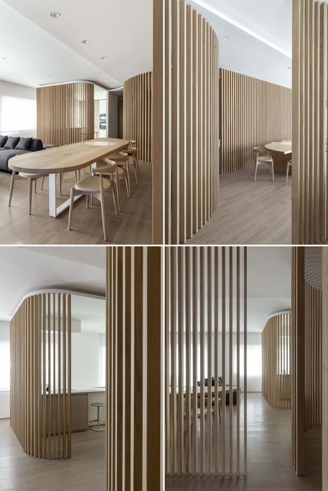 Oak Slat Walls Divide The Spaces Inside This Apartment's Interior Curve Wall Design Interiors, Curved Partition, Wall Separation Ideas, Separate Living Room And Dining Room, Separate Living And Dining Room, Slat Walls, Modern Partition Walls, Room Partition Wall, Wood Partition