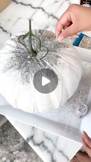 Tamara Bradshaw on Instagram: "DIY Glam Pumpkins✨ ⠀ Ok so who’s ready for the fall?!! Welp I’m not. But hey here are some Glam DIY Pumpkins I did last fall. And they got a quick lil feature on the Tamron Hall show!!✨ ⠀ Quick and easy to make with velvet fabric from Hobby Lobby and Joann Fabric & Craft. I use mod podge glue to adhere the glitter and hot glue gun for the beads. Have fun with it and add glitter, beads etc. The possibilities are endless and there is no wrong. Just have fun with it✨ ⠀ #pumpkin #pumpkins #diydecor #diycrafts #diyproject #diy #diyhomedecor #diyprojects #diyhomeprojects #diyhomedecorating #diyidea #diyideas #diylove #diylovers #diylover #weekend #weekendvibes #weekendmood #home #decor #houstonhome #instaluxe #designinspo #instahome #instadecor #glamhome #homeinspo Sparkly Pumpkin Decorating Ideas, Bejeweled Pumpkins Diy, Glitter Pumpkin Ideas, Crafts With Foam Balls, Mod Podge Pumpkins, Halloween Floral Arrangements Diy, Glam Fall Decor Ideas, Hobby Lobby Fall Decor Ideas, Glitter Pumpkins Diy