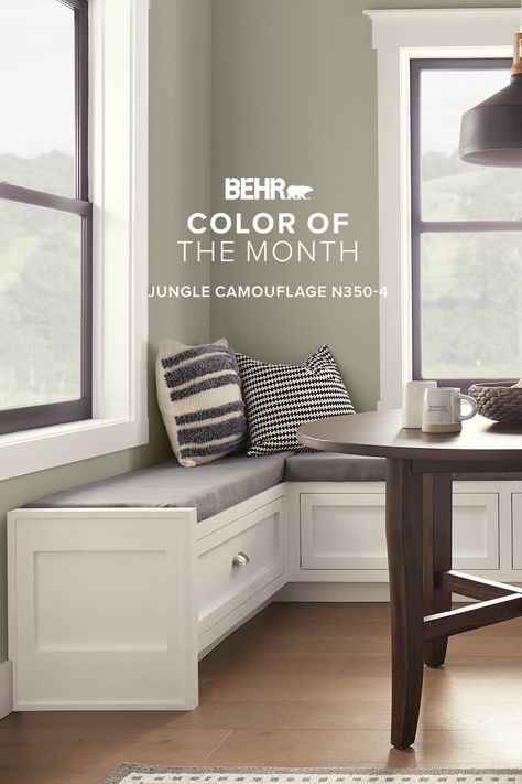 Explore our Color of the Month, Jungle Camouflage, a mellow neutral green. Pair this color with dark or reclaimed metals to give your space a classic antique look. Jungle Camouflage, Green Siding, March Colors, Behr Colors, Color Of The Month, Cozy Breakfast Nook, Black Countertops, Behr Paint, Green Paint Colors