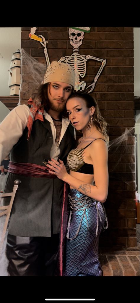 Mens Mermaid Costume, Siren Couples Costume, Couple Halloween Costumes Mermaid, Merman Halloween Costumes, Siren And Sailor Costume Couples, Sea Captain And Siren Costume, Mermaid And Pirate Halloween Costumes, Siren Sailor Costume, Pirate And Mermaid Costume Couple