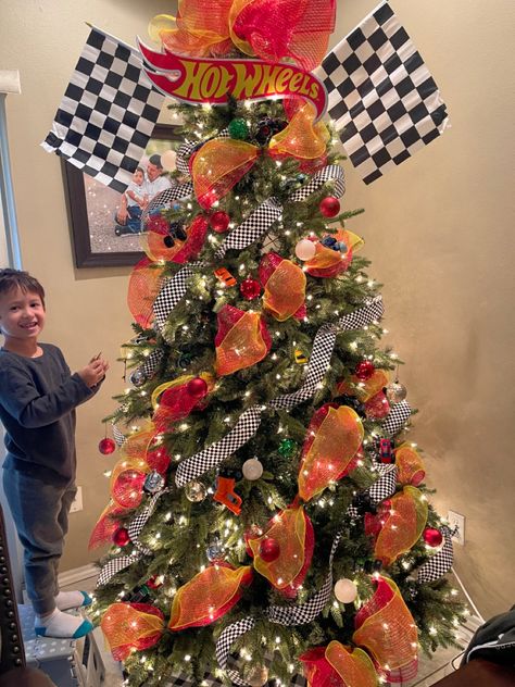 Small Boy Christmas Tree, Firetruck Christmas Tree, Cars Christmas Tree Disney, Boys Christmas Trees, Cars Theme Christmas Tree, Hot Wheel Christmas Tree, Race Car Christmas Tree Ideas, Nascar Christmas Tree, Disney Cars Christmas Tree