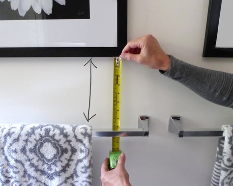 make Two Towel Bars On Same Wall, How To Hang Towels In Bathroom, Towel Bars In Bathroom, How To Hang Towels, Picture Hanging Height, Picture Hanging Tips, Hanging Bath Towels, Hang Towels In Bathroom, Toilet Pictures