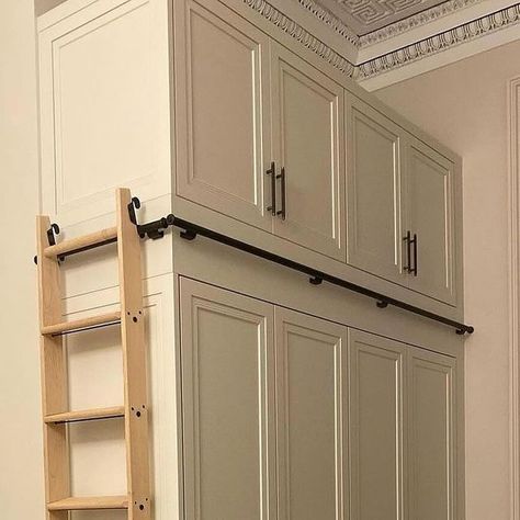 LLCompany | UK on Instagram: "🌟 Explore the innovative design of this sleek built-in wardrobe by @tempus4_ltd 🚪 This bespoke creation includes a custom-built ladder, maximizing every inch of available space. Our hook-on hardware from @libraryladderco elegantly stows the ladder upright, ensuring no compromise on room space. Discover how this design showcases the perfect harmony between functionality and style! . . . . #builtinwardrobe #customdesign #interiordesign #spacesavingsolution #innovativestorage #bespokefurniture #homeorganization #interiorladder" High Wardrobe Design, Tall Built In Wardrobe, Built In Wardrobe With Ladder, Built In With Ladder, Closet Ladder Ideas, Wardrobe With Ladder, Tall Closet Organization, Closet With Ladder, Wardrobe Ladder