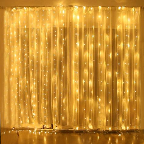 PRICES MAY VARY. 300 led Curtain Lights. 9.84 ft long 9.84ft wide 300 Led Icicle Lights with 10 light strands and each string contains 30 pcs Led lights. You can connect multiple sets of string lights, up to 3, share one power supply and cover most of standard windows, walls and even perfect to wrap it around a canopy bed or pergola in the backyard. 8 Mode settings, Press the button on the transformer to choose from the 8 different light effects, combination, in waves, sequential, slogs , chasin Twinkle String Lights, White Christmas Lights, Led Curtain Lights, Led Curtain, Curtain String Lights, Outdoor Christmas Tree, Icicle Lights, Wedding Wall, Garden Bedroom