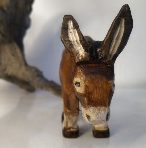 wooden donkey, long eared brown donkey looking for crop, woodcarving donkey statue, donkey sculpture, whittled and painted donkey by woodaboutarts on Etsy Donkey Statue, Wooden Donkey, Swan Lake Costumes, Baby Jesus Ornament, Ornament Exchange, Nativity Ornaments, Three Wise Men, Holy Night, Whittling