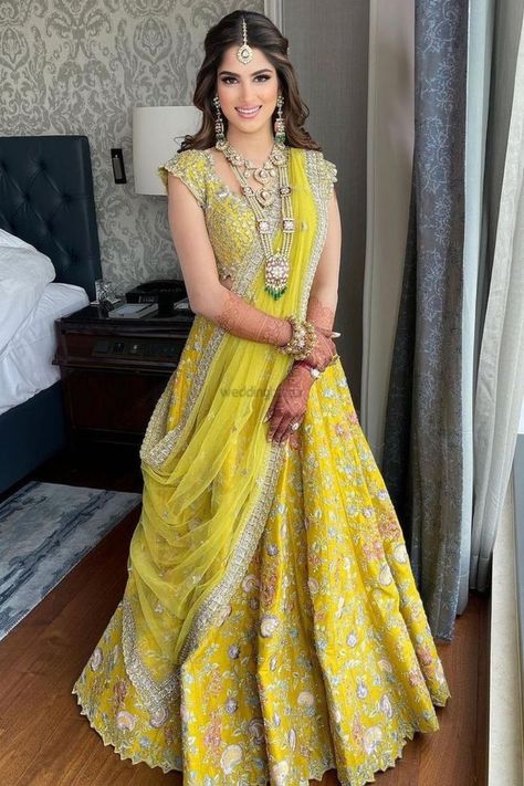 Presenting you latest embellished lehengas for brides for each function. #weddingbazaar #indianwedding #embellishedlehengamirror #embellishedlehengablack #embellishedlehengablouse #embellishedlehengaheavy #embellishedlehengared #embellishedlehengawhite #embellishedlehengagolden #embellishedlehengaivory #embellishedlehengablue #embellishedlehengasequin #embellishedlehengapearl #embellishedlehengagrey #embellishedlehenganet #embellishedlehengasilver #embellishedlehengafloral #embellishedlehenga Haldi Jewellery, Bride Collection, Haldi Dress, Heavy Lehenga, Dream Marriage, Wedding Dates, Latest Bridal Lehenga, Mehndi Ceremony, Bridal Design