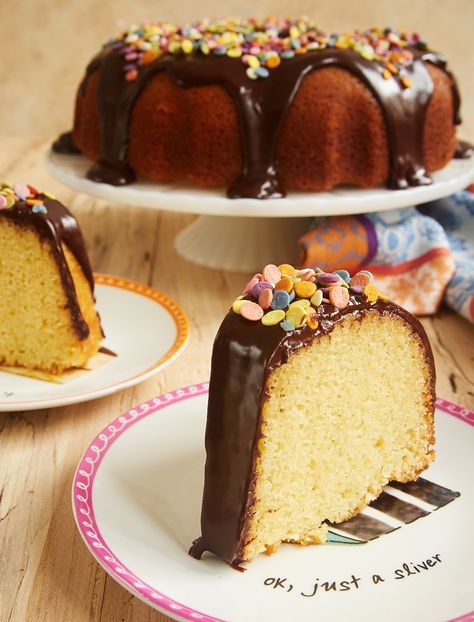 Yellow Bundt Cake with Dark Chocolate Ganache is one of my favorite celebration cakes, thanks to its crowd-pleasing flavors and ease of preparation. Just add sprinkles! - Bake or Break ~ http://www.bakeorbreak.com Yellow Bundt Cake, Ganache Cake, Chocolate Garnishes, Pillsbury Recipes, Dark Chocolate Ganache, Lemon Bundt Cake, Happy Yellow, Cake Recipes From Scratch, Healthy Banana