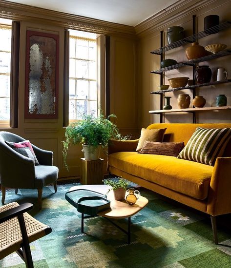 Homes & Gardens on Instagram: “Ochre & Green — The glow of a velvet yellow sofa creates a focal point in this elegantly muted living room. A geometric flatweave rug in a…” Yellow Couch, Taupe Walls, Latest Sofa Designs, Yellow Sofa, Yellow Room, Open Plan Living Room, Corner Sofa Set, Living Room Shelves, Room Partition