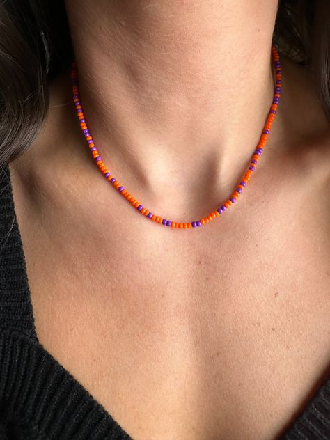 Limited Edition Necklace Petite, but playful. This necklace is a perfect sprinkle of neon orange and purple! This small but mighty piece instantly elevates any look. 3mm mixed neon orange and purple seed bead water resistant and sweat proof Orange Necklace, Small But Mighty, Sweat Proof, How To Apply Makeup, Neon Orange, Orange And Purple, Body Oil, Seed Bead, Plastic Bag