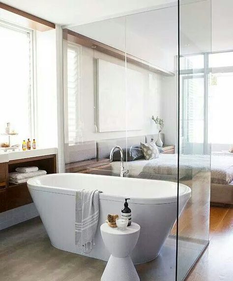 a free-standing bathtub spearated with a glass space divider for gentle separation Beautiful Bathroom Designs, Contemporary Bathroom Designs, Bad Inspiration, Dream Bathrooms, Tub Shower Combo, Bath Room, Bathroom Renos, Bathroom Style, Bath Tub