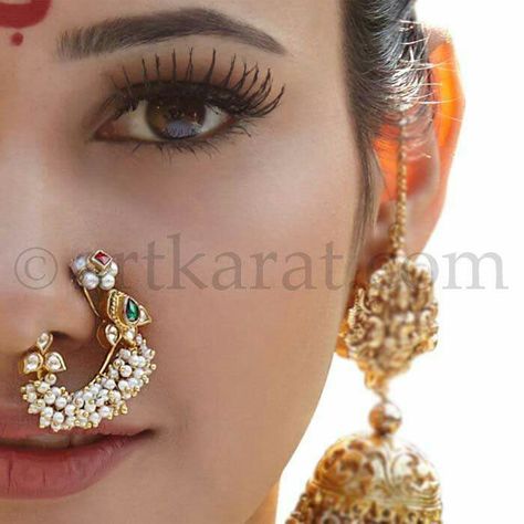 Nath (nose ring) by Artka https://pin.it/3-lfIbT What do you think? https://pin.it/3-lfIbT rat Nose Ring Designs, Nose Jewels, Maharashtrian Jewellery, Nath Nose Ring, Nose Ring Jewelry, Saree Bollywood, Indian Accessories, Indian Bridal Photos, Indian Nose Ring