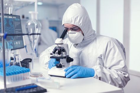 Free Photo | Microbiologist with protection glasses using microscope dressed ppe suit Microbiology Lab, Pharmaceutical Manufacturing, Research Scientist, Regulatory Compliance, Pharmaceutical Industry, Biochemistry, Microbiology, Biotechnology, Test Tube