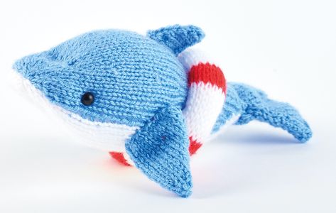 https://www.letsknit.co.uk/free-knitting-patterns/knitted-dolphin Knitted Easter Crafts, Swimming Ring, Animal Knitting Patterns, Knitting Patterns Toys, Free Knitting Patterns, Yarn Stash, Knitted Animals, Just Imagine, Fish Patterns