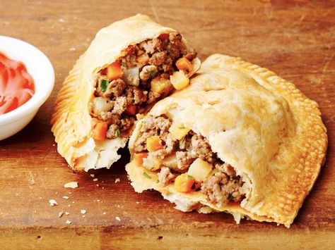 Meat Hand Pie Recipe, Pasties Recipes, Hand Pie Recipes, Hand Pie, State Foods, Meat Pie, Hand Pies, Cooking Channel, Beef Dishes