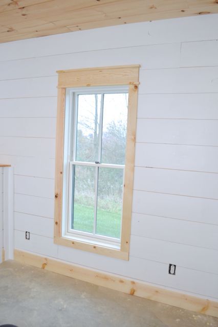 installing DIY shiplap walls and farmhouse trim from wood flooring 1x4 window trim 1x6 baseboards Farmhouse Trim Baseboards, Farmhouse Window Trim, Diy Window Trim, Farmhouse Trim, Interior Window Trim, Cottage Bath, Shiplap Wall Diy, Trim Ideas, Shiplap Walls