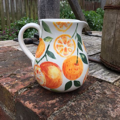 Hand painted ceramic jug 🍊 #oranges #seville #sevilleoranges #jug #ceramics #pottery #potterystudio #mothersdaygift #handpainted #handpaintedceramics Oranges Ceramic Painting, Vintage Painted Pottery, Pottery Painting Ideas Pitcher, Painted Jug Ideas, Hand Painted Jug Ideas, Paint It Pottery Ideas, Hand Painted Jug, Pottery Jugs Ideas, Orange Pottery Painting