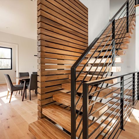 open staircase, floating stairs, elm stair treads, wood stairs, live edge stairs, metal stair rails, horizontal railing, stained stairs, screen wall, modern, contemporary home design, modern interior Live Edge Stairs, Unique Staircase Ideas, Stained Stairs, Unique Staircase, Mexican Style Home, Wood Railings For Stairs, Metal Stair Railing, Open Stairs, Staircase Design Modern