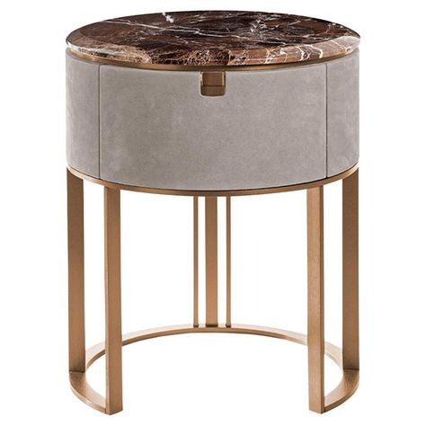 The simplicity of Glory bedside table is only apparent. A cylindrical shape covered in nabuck, an original base made of metal in the new copper finish. The round top is in marble. Round Bed Side Table, Luxury Bedside Tables, Copper Chairs, Ottoman Stools, Round Bedside Table, Copper Chair, Round Side Tables, Luxury Bedside Table, Bedside Table Round