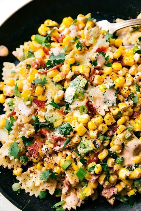 One of the most popular recipes on this site: Mexican Street Corn Pasta salad! Tender pasta, charred corn, & the best chili-lime dressing! ... less by Chelsea's Messy Apron Pasta Mexicana, Mexican Street Corn Pasta Salad, Mexican Street Corn Pasta, Creamy Chili, Low Carb Veggie, Street Corn Pasta Salad, Street Corn Pasta, Corn Pasta Salad, Grain Salads