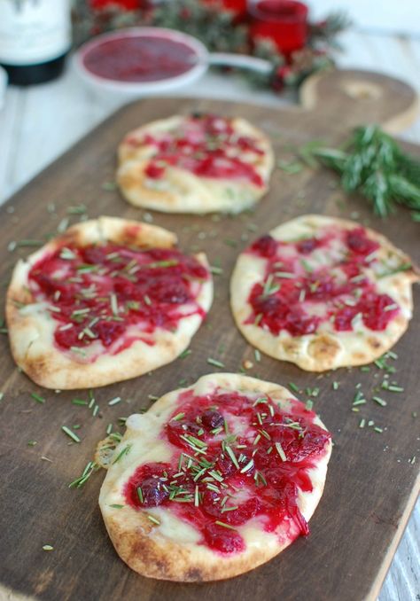 Warm Brie Cranberry Naan is a festive, naan-traditional holiday appetizer. Mini naan bread is topped with warm, creamy brie cheese, a sweet cranberry sauce, and finished off with freshly chopped rosemary.// A Cedar Spoon AD Mini Naan Bread, Warm Brie, Mini Naan, Brie Cranberry, Healthy Christmas Recipes, Spaghetti Meatballs, Naan Recipe, Holiday Appetizer, Brie Cheese