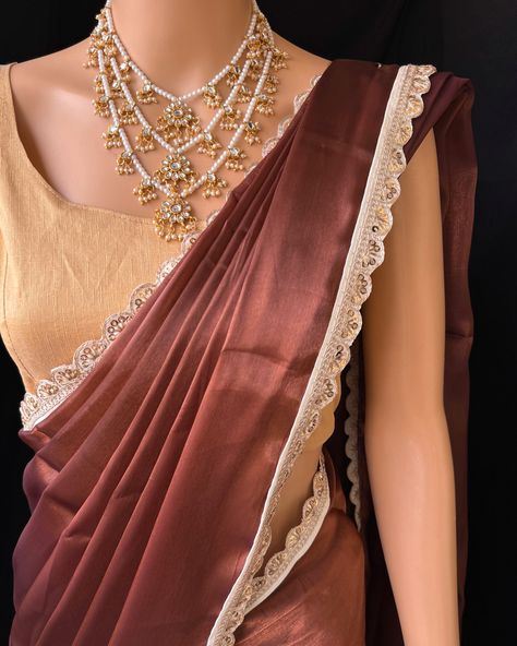 Rust brown organza saree with contrast White golden lace all over sarees. Saree alone To find this product in website: Www.thejacouture.in >organza sarees> Rust brown organza saree. Jewellery collaboration: @anvi__jewellery #organzasaree #trendingsaree #traditional #organzalacesaree #lacesarees #sarees #sareelove #brownsaree Organza Saree Jewellery, Brown Organza Saree, Brown Saree, Saree Jewellery, Lace Saree, Golden Lace, Organza Sarees, Organza Saree, Rust