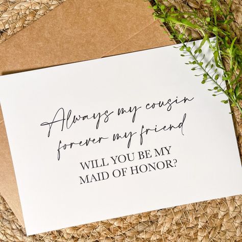 "\"Always my cousin, forever my friend, will you be my?\" Asking your cousins to be a part of your big day is so special and these cards will help with that! Ask your cousin to be a part of your day with this card! Check Out Other Bridesmaid proposal cards here: https://www.etsy.com/shop/ZeilerMade?section_id=32661337 - Single sided/ not foldable card - Includes kraft envelope - Measures approx 5in x 7in If you would like a role other than the ones pictured, please select other and state what ro Cousin Made Of Honor Proposal, Entourage Proposal Ideas, Maid Of Honor Proposal Cousin, Cousin Bridesmaid Proposal, Will You Be My Bridesmaid Letter, Diy Bridesmaid Proposal Cards, Would You Be My Bridesmaid, Bridesmaid Proposal Sayings, Bridesmaid Proposal Card Messages