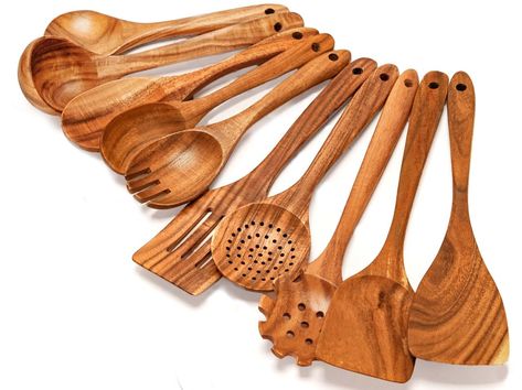 PRICES MAY VARY. 10-Piece Wooden Cookware Set Includes: Includes flat frying spatula, wok spatula, slotted spatula, spaghetti pasta server, serving spoon, mixing spoon, soup ladle/soup spoon, skimmer spoon, seasoning/oil spoon and salad fork. 100% TEAK WOOD: our kitchen utensils will last long, they are made of one 100% Natural Teak Wood. These tools are handcrafted, solid, sturdy, smooth, well designed and have a superb finish. Utensils may vary in shade because of its natural material. EASY TO Teak Cooking Utensils, Serving Utensils Set, Kitchen Gift Ideas, Wooden Cooking Utensils Set, Nonstick Pans, Amazon Kitchen Finds, Wooden Utensils Set, Wooden Cooking Utensils, Pasta Server