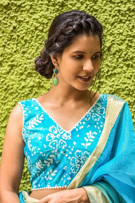 Blue batik printed cotton blouse with pom pom edging #blouse #saree #houseofblouse #desi #indianwear #summer #vneck #batik #print #blue #white #pompom Batik Saree Blouse Designs, Print Blouse Design, Cotton Blouse Pattern, V Neck Blouses, Indian Closet, Sleeveless Blouse Designs, Designer Blouses Online, Ikat Blouse, Exams Funny