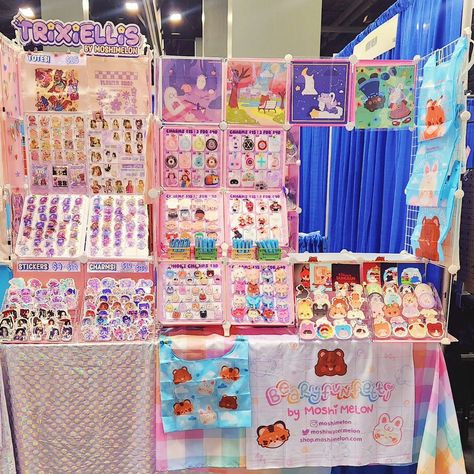 We are here at #floridasupercon at table 1448 with @marinaxstudios and @tokki_sprout 💖 come say hi and buy some cute goodies! #supercon #kpop #danmei #artistalley #pastelaesthetic #kawaiiaesthetic Artist Alley Table Display, Artist Alley Display, Vending Display, Alley Ideas, Art Festival Booth, Craft Displays, Vendor Table, Festival Booth, Craft Booth Display