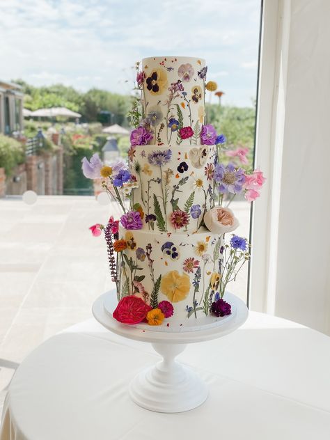 wildflower wedding cake in bright bold colours. Old Hall Ely wedding cake. pressed flower wedding cake design. edible flowers. Wildflower Cake, Debut Theme, Edible Flowers Cake, Colorful Wedding Cakes, Wedding Cake Display, Fresh Flower Cake, Floral Wedding Cake, Floral Wedding Cakes, Naked Cakes