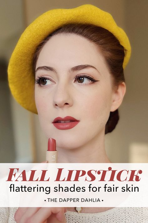 Woman with red hair and fair skin wearing a yellow beret and holding a tube of lipstick by Ilia. Fall Lip Colors For Fair Skin, Fall Lipsticks For Fair Skin, Lipstick For Pale Skin Brunettes, Dark Autumn Lipstick Palette, Fall Makeup For Fair Skin, Red Lipstick For Soft Autumn, Brown Lipstick For Fair Skin, Fall Red Lipstick, Warm Autumn Lipstick Colors