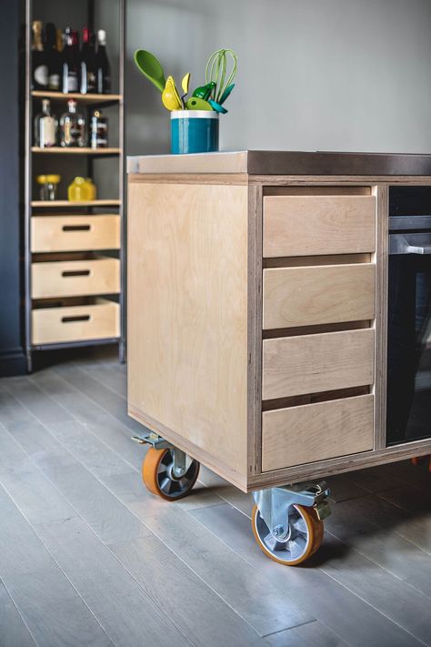 Pegboard Plywood Kitchen with industrial movable island on yellow castors Kitchen Layout Ideas With Island, Sustainable Kitchen Design, Kitchen Islands Ideas With Seating, Pegboard Kitchen, Kitchen Island Storage, Plywood Kitchen, Modern Kitchen Island, Sustainable Kitchen, Oak Shelves