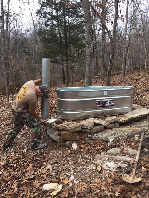 Our rocket stove hot tub — Steemit Galvanized Hot Tub, Galvanized Stock Tank Hot Tub Ideas, Rocket Stove Hot Water Heater, Water Trough Hot Tub Diy, Rocket Stove Hot Tub, Homemade Hot Tub, Natural Hot Tub, Hillbilly Hot Tub, Rustic Hot Tubs