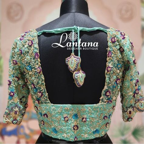 Dive into Elegance with this Stunning  Aqua Blue Bridal Blouse .This Blouse intricate Embroidery in vibrant hues of Purple, Gold and Turquoise with sophisticated open back design and beautiful tassels and detailed thread work and cutdana beads.... embroidery,best designs,boutique
different designer blouses,blouses, hand work,aari work, thread, Beads Embroidery, Bridal Blouse, Blue Bridal, Designer Blouses, Aari Work, Intricate Embroidery, Thread Work, Hand Work, Back Design