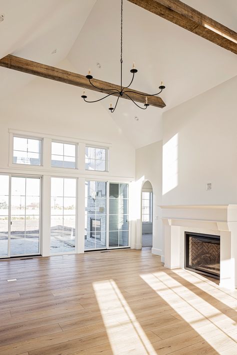 We love this beautiful home featuring our Reclaimed Norway Pine Beams / Timbers. Light Floors Dark Beams, Vault Ceiling Beams, Faux Wood Beams Living Room, Exposed Wood Beams Kitchen, Timber Beams Ceiling, Exposed Beams Living Room, Shiplap Ceiling Vaulted, Wood Beam Ceiling Living Room, Fake Beams Ceiling