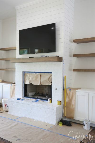 Client Project Sneak Peek: Splurging and Saving Tile Fireplace Ideas, Black Tile Fireplace, Oak Floating Shelves, Built In Shelves Living Room, Living Room Built Ins, Build A Fireplace, Fireplace Shelves, Shiplap Fireplace, Built In Cabinet